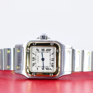 Cartier bi-metal ‘Santos’ 24 x 35 mm bi-metal watch model 166930 on bi-metal bracelet. Model and serial number with signature to rear cover. Silver grey signed dial with black roman numerals, having secret signature to 7. Bracelet is approx. 122mm long. Comes in Cartier box.