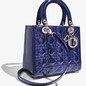 Beautiful and authentic Chistian Dior Lady Dior blue patent leather and silver hardware. Excellent condition.